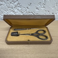 Antique sewing kit in box