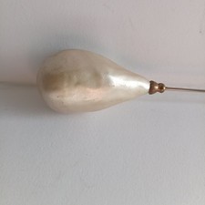 Grande épingle à chapeaux