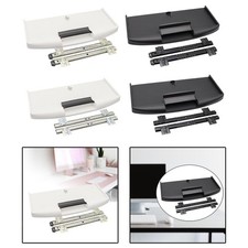 Sous le tiroir du clavier de