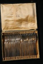 12 couverts de table en métal