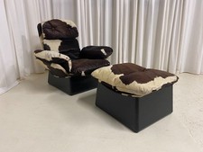 Fauteuil et repose pieds vache