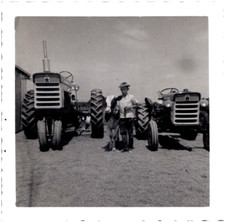 Young Farmer Boy & Calf Between International Harvester IH Tractors 1950s Photo
