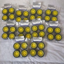 Lot de 10 pneus jaune Kyosho