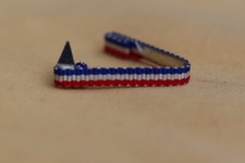 Fixe ruban rappel boutonnière