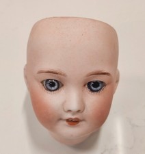 Tête de poupée ancienne en