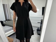 Petite robe noire aspect soie S 36 38 H&M classique confortable