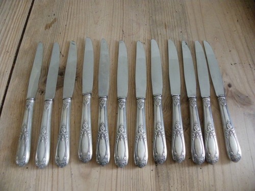 Couteaux métal argenté - 12,