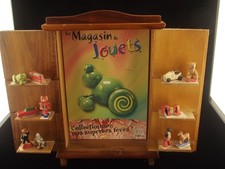 Collection of beans "the toy store" in its wooden display