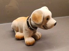 CHIEN TIRELIRE QUI BOUGE LA