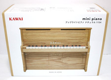 Mini piano droit Kawai 1154