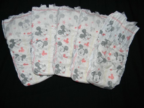 Huggies snug dry - &,