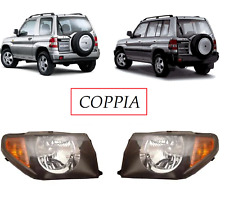 2 x PHARES FEUX AVANT POUR PROJECTEURS MITSUBISHI PAJERO PININ PININ