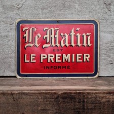 Plaque publicitaire journal «