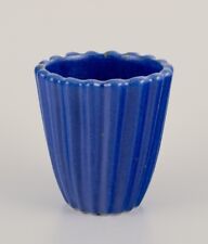 Christian Poulsen, own workshop, Denmark.  Unique ceramic vase in grooved design