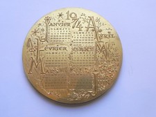 Medaille calendrier année