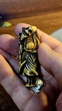 An antique netsuke Sennin with Sake bottle on his shoulder