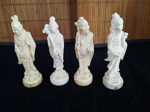 Quatre figurines asiatiques - , en