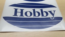 HOBBY Prestige Caravan Logo