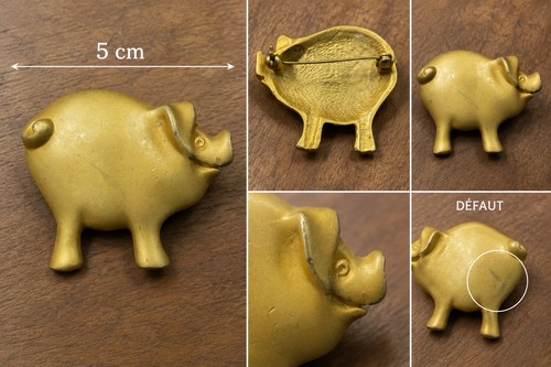 Jolie broche métal doré - en,