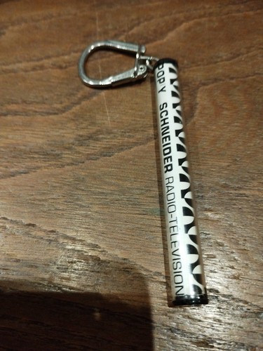 Porte clés pop schneider - porte,