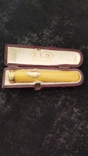 Amber or Bakelite Cigarette Door Filter and 18k Gold Eagle Head Punch