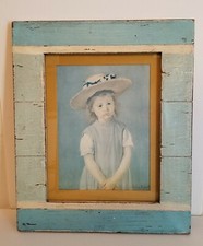 Child in a Straw Hat by Mary
