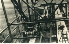 Photo card to identify looks scaffolding seen from a gate at the bottom