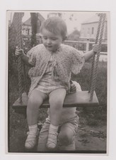 old photo ?️ child on swing, family garden 1950s
