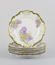 P. Dauphin, Paris. Set of six Art Nouveau faience plates decorated with flowers