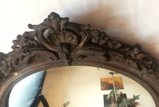 Important miroir oval mural et