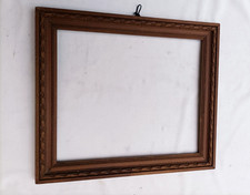 Cadre en bois sculpté fin