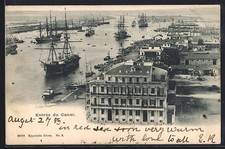 Old postcard Port-Said, Canal entrance, boats 