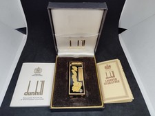 Ancien briquet à gaz Dunhill Rolla motif poudre dorée laque noire avec boite