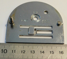 cache plaque aiguille MACHINE