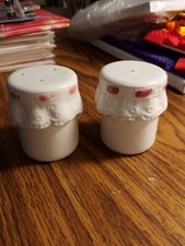 SIA Salt and Pepper Shackers. Jam Covered With Pink Ribbon.