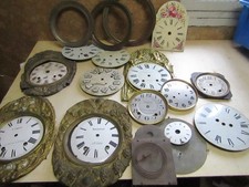 lot of facades and dials d clock comtoise