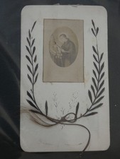 Pious image of deaths st louis de gonzague with plant branches