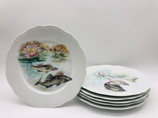 6 assiettes Porcelaine de