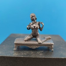 Black brass figurine, sexy beauty kneeling, pulling clothes, ornament