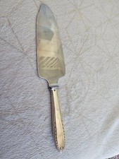 Pelle à tarte coupante