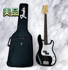 Basse électrique Fender Japan Precision Bass noire d'occasion très bel état