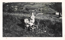OLD PHOTOGRAPH STROLLER IN A
