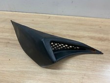 UN CACHE PLASTIQUE CARENAGE