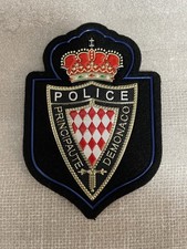 ÉCUSSON A SCRATCH POLICE MONACO  -  SÛRETE PUBLIQUE