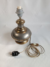 tin and brass lamp