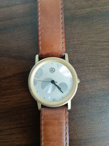 Montre quartz vintage - à,