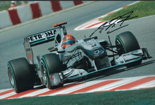 MICHAEL SCHUMACHER - 7 TIME F1 WORLD CHAMPION - SUPERB HAND SIGNED 12x8 PHOTO