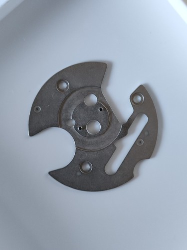 Date indicator hold plate - hold,