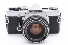 Appareil photo reflex argentique Olympus OM-1N "Exc+5" objectif F.Zuiko...
