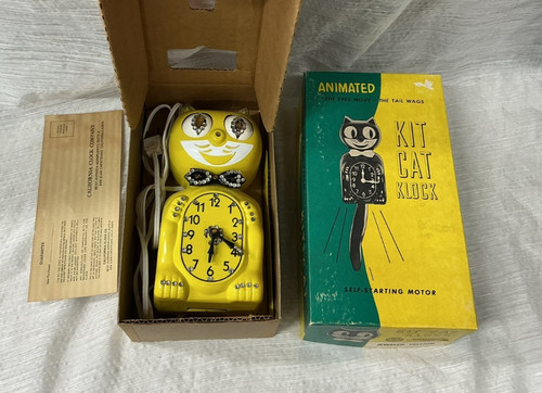 Yellow bejeweled kit cat klock - yellow,